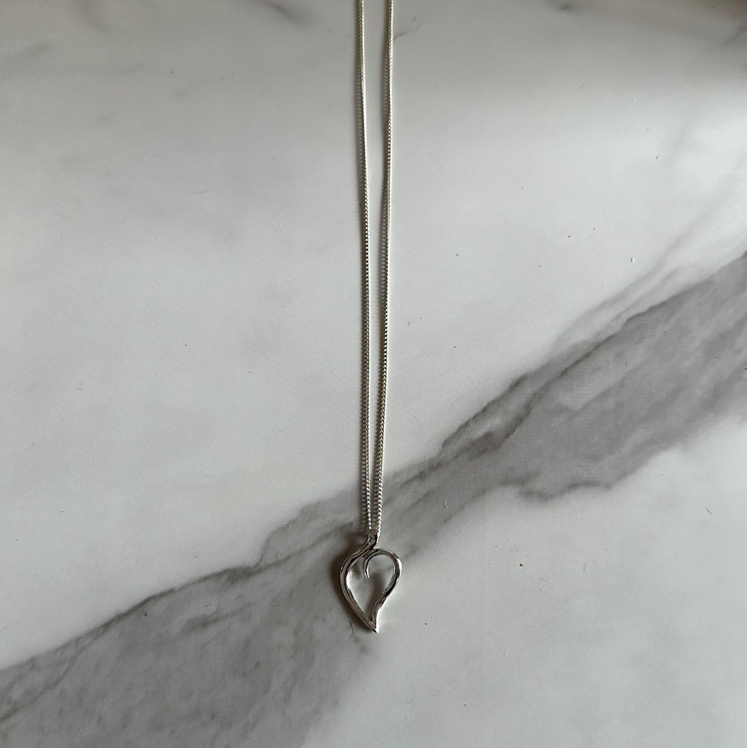 Tiffany & Co. Elsa Peretti open heart necklace in sterling silver