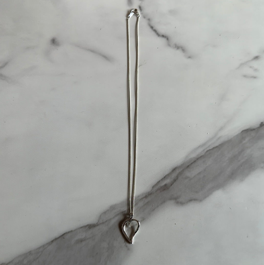 Tiffany & Co. Elsa Peretti open heart necklace in sterling silver
